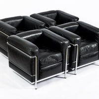 Pair of Cassina LC2 Black Leather Petit Lounge Chairs by Le Corbusier