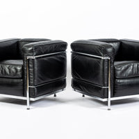Pair of Cassina LC2 Black Leather Petit Lounge Chairs by Le Corbusier