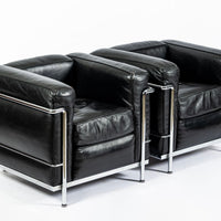 Pair of Cassina LC2 Black Leather Petit Lounge Chairs by Le Corbusier
