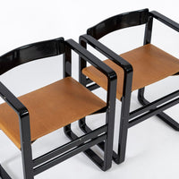 Mid Century Modern Black Lacquer and Brown Leather Arm Chairs 1970s