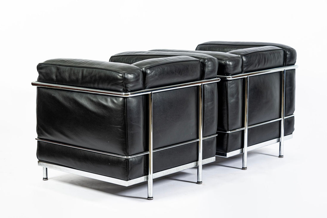 Pair of Cassina LC2 Black Leather Petit Lounge Chairs by Le Corbusier