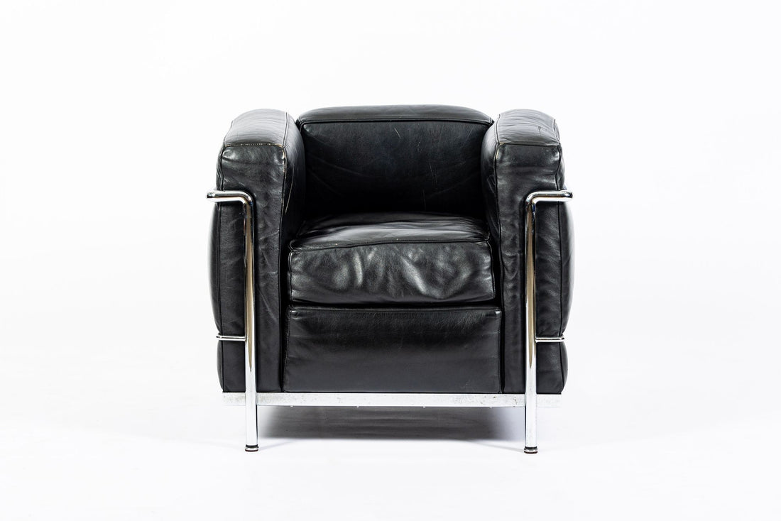 Pair of Cassina LC2 Black Leather Petit Lounge Chairs by Le Corbusier