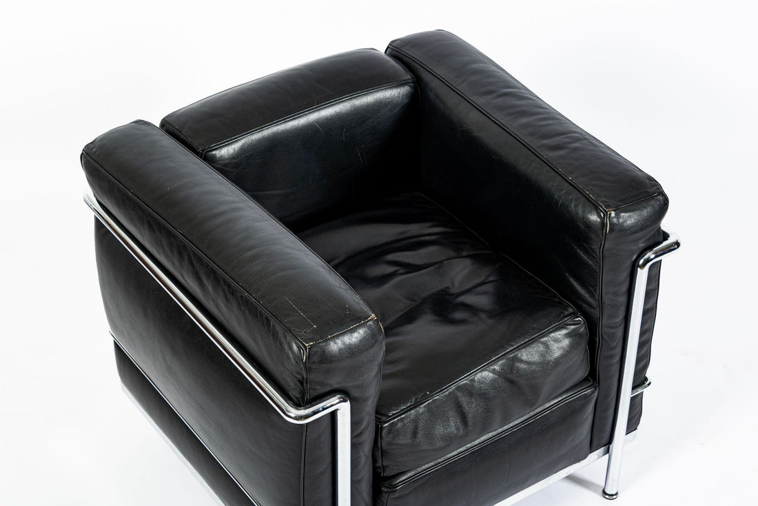 Pair of Cassina LC2 Black Leather Petit Lounge Chairs by Le Corbusier